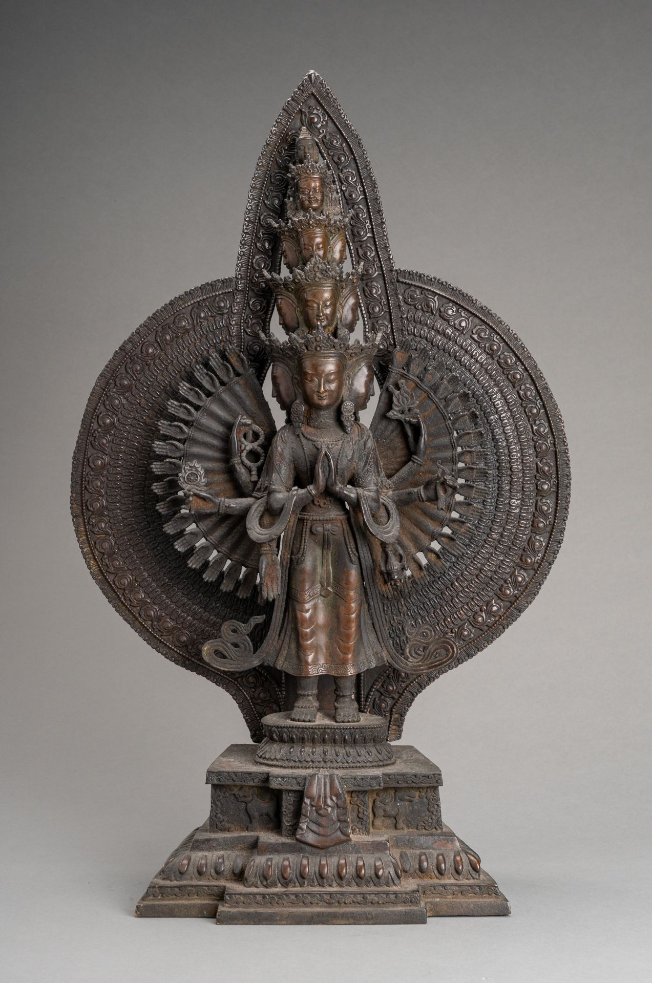 A LARGE BRONZE FIGURE OF AVALOKITESHVARA EKADASA MUKHA, c. 1900s