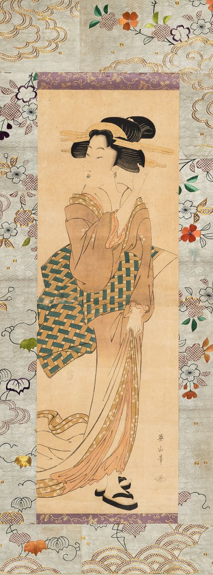 KIKUGAWA EIZAN (1787-1867): A TWO-PART COLOR WOODBLOCK PRINT KAKEMONO OF A BEAUTY
