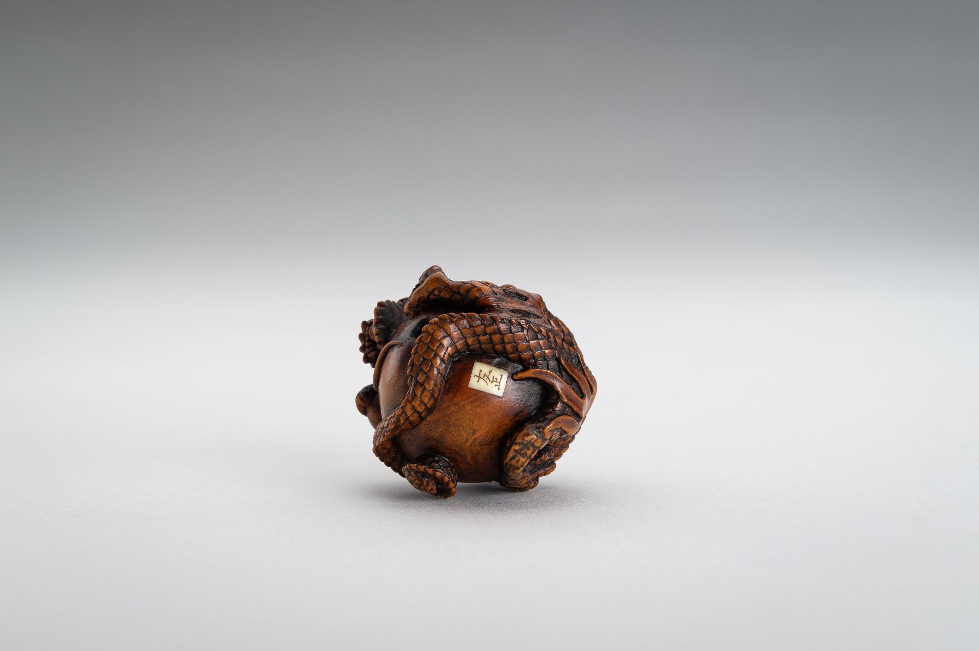 TOMOMASA: A BOXWOOD NETSUKE OF A COILED DRAGON - Image 13 of 15