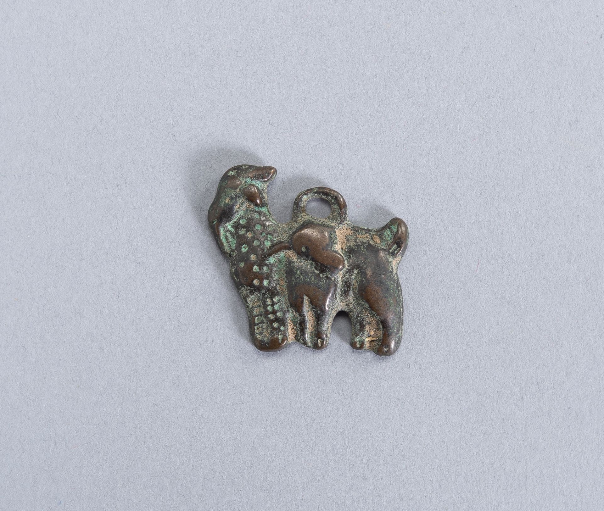 AN ORDOS BRONZE Â´SHEEP AND LAMBÂ´ PLAQUE, WARRING STATES