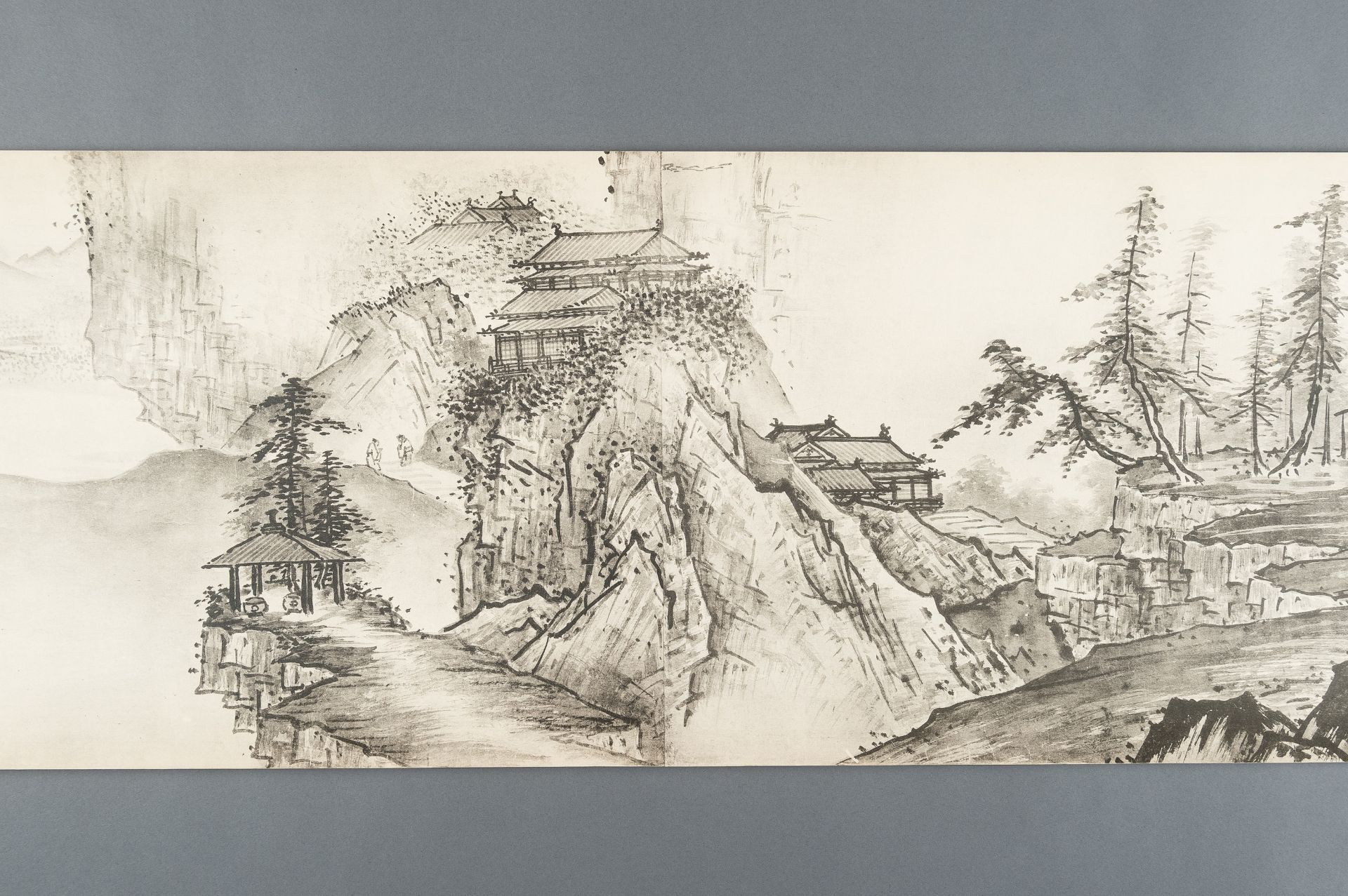 AFTER SESSHU TOYO: A VERY LONG PRINTED HANDSCROLL OF A LANDSCAPE