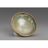 A LOBED TURQUOISE AND BROWN GLAZED CERAMIC BOWL