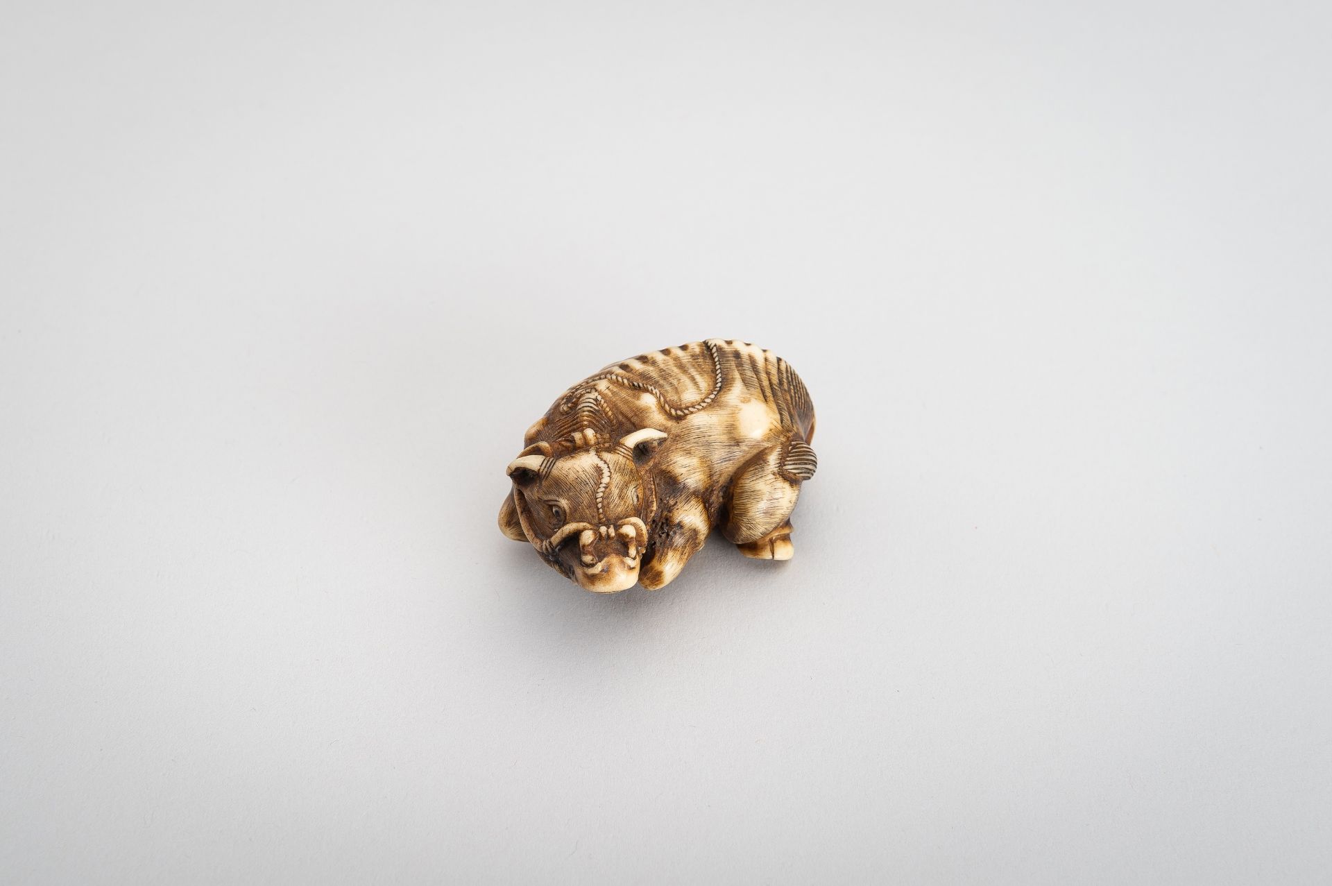 A STAG ANTLER NETSUKE OF RECUMBENT OX - Image 10 of 11