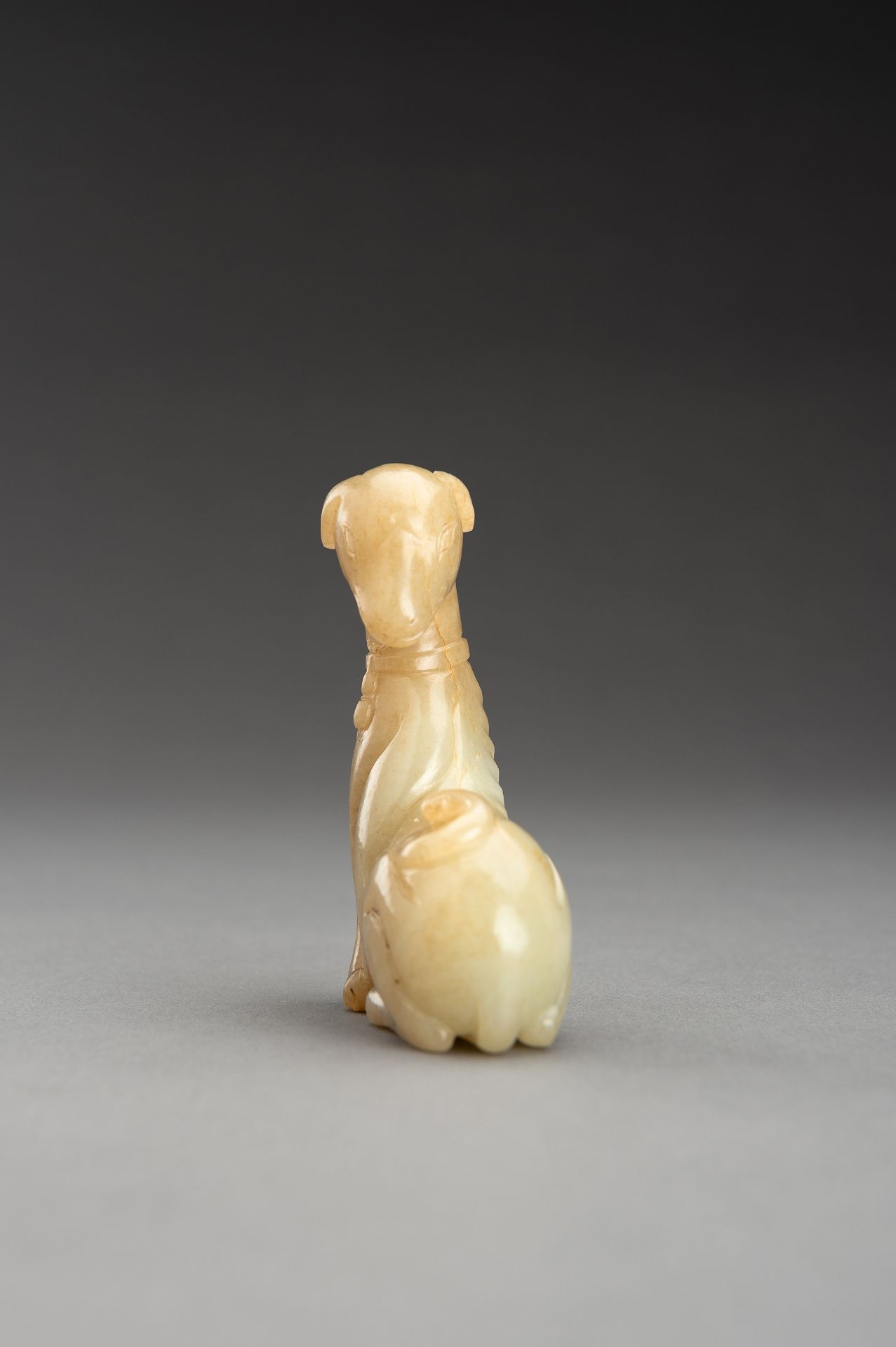 A PALE YELLOW JADE FIGURE OF A DOG, QING - Bild 5 aus 12