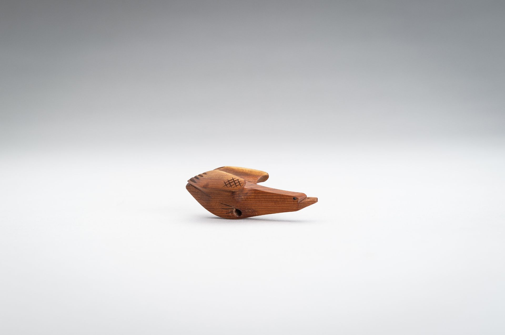 SUKETOMO: A HIDA SCHOOL ITTOBORI WOOD NETSUKE OF A BIRD - Image 3 of 11