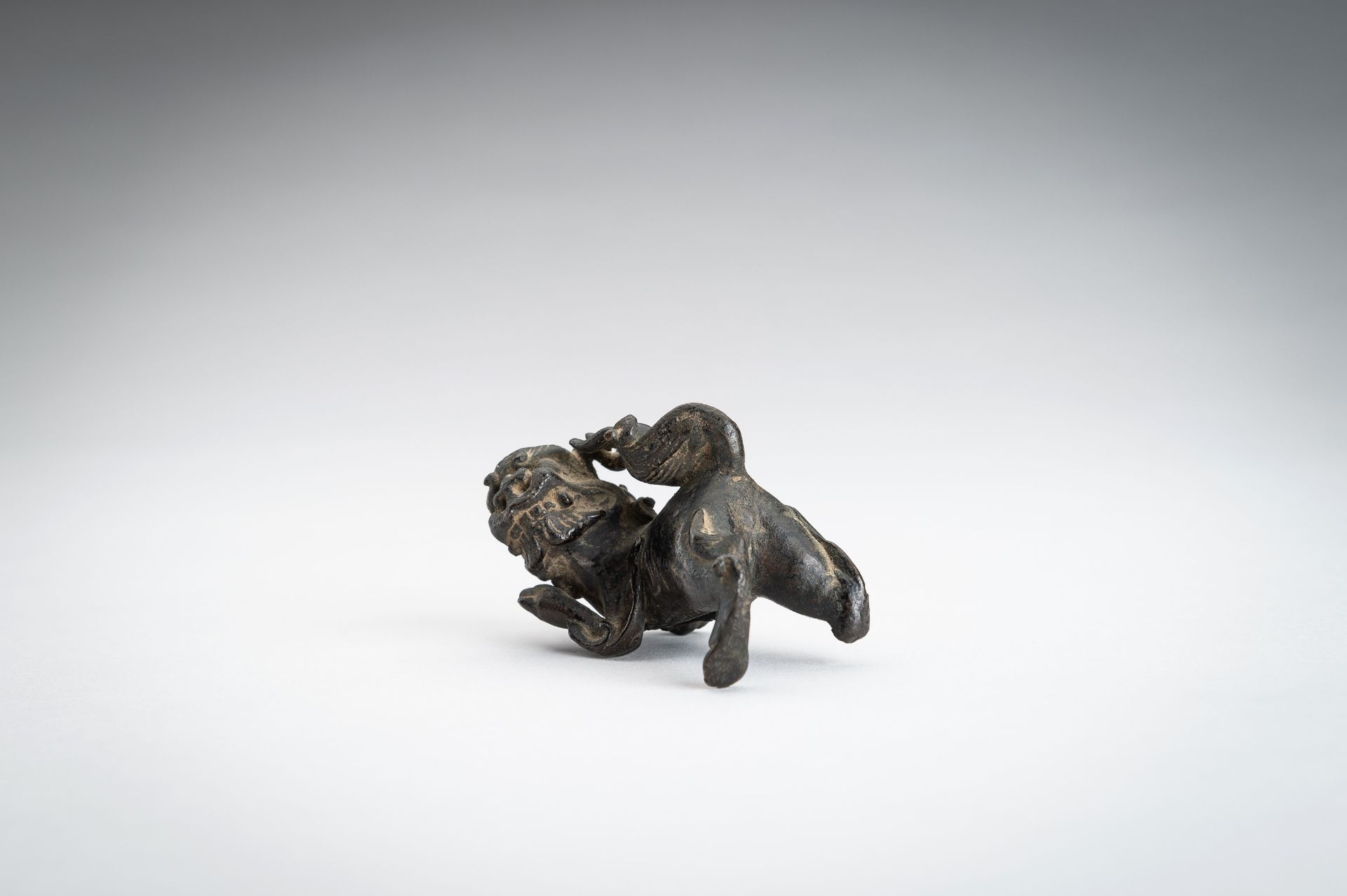 A BRONZE 'BUDDHIST LION' ORNAMENT, MING - Image 10 of 14