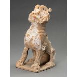 A POTTERY FIGURE OF A HORNED GUARDIAN BEAST, TANG DYNASTY OR EARLIER