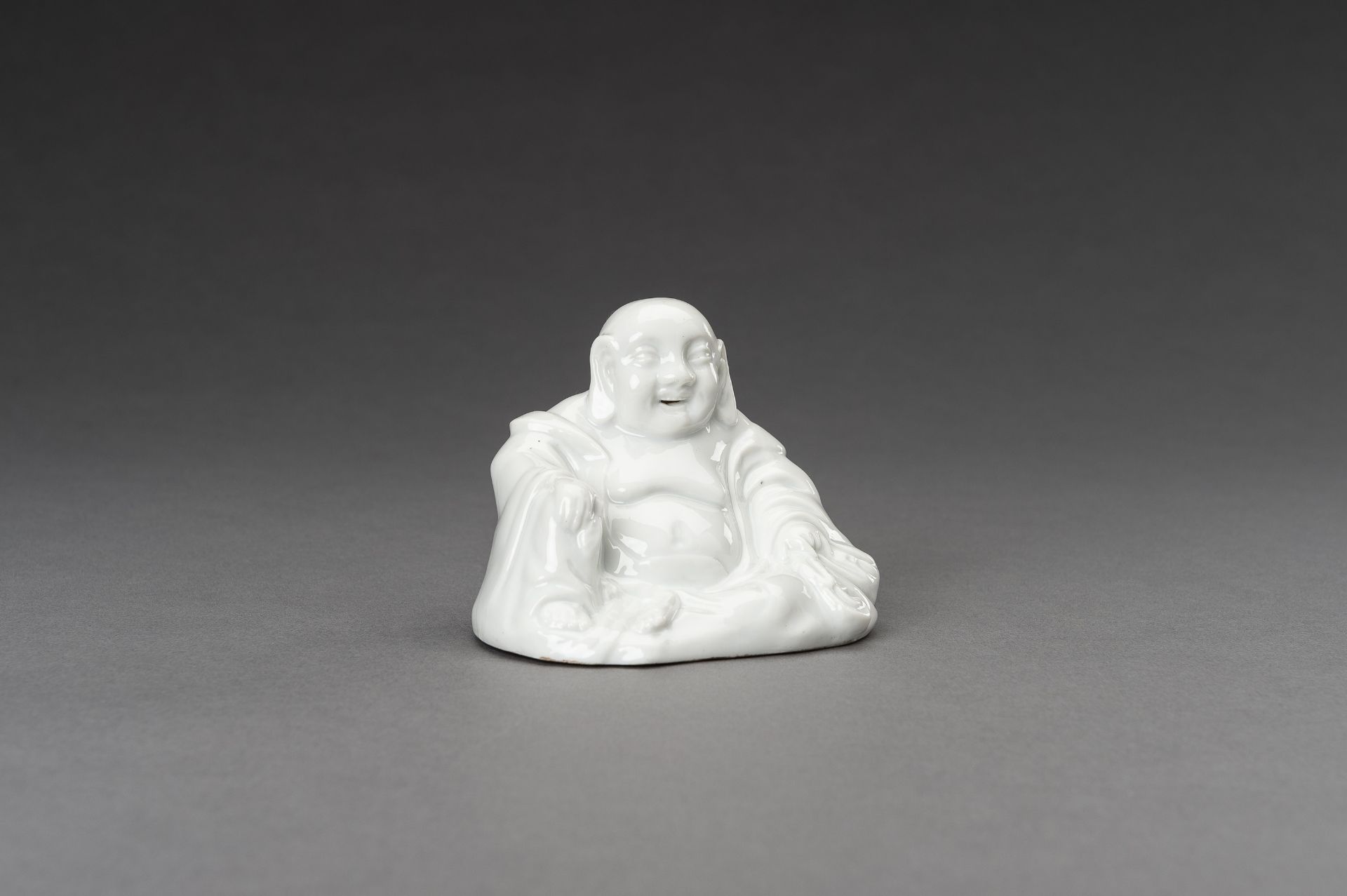 A BLANC DE CHINE PORCELAIN FIGURE OF BUDAI, c. 1920s - Image 7 of 11