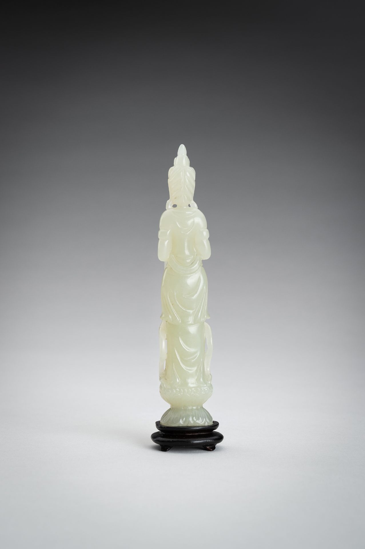 A PALE CELADON JADE CARVING OF A GUANYIN, 1900s - Image 10 of 11
