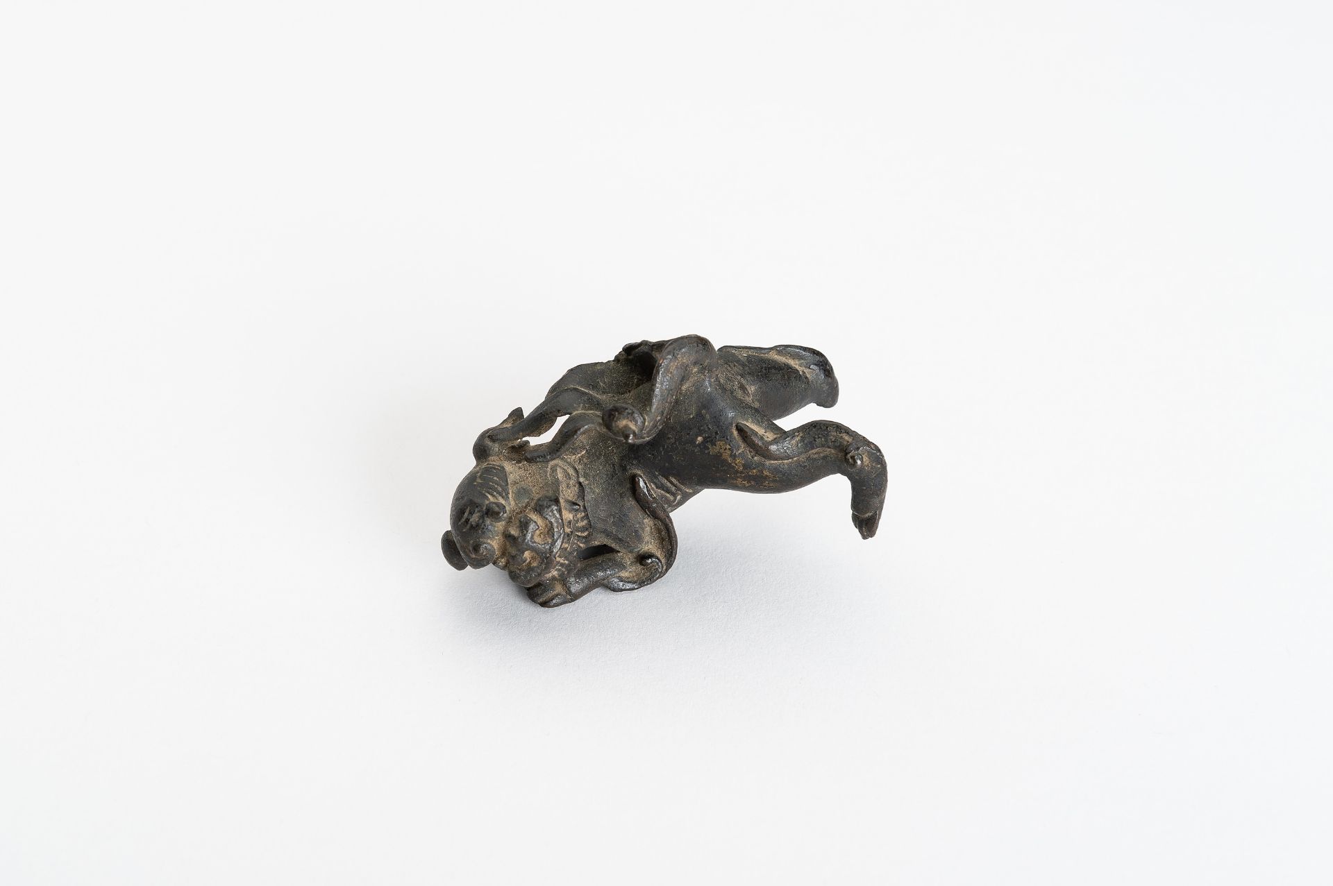 A BRONZE 'BUDDHIST LION' ORNAMENT, MING - Image 13 of 14