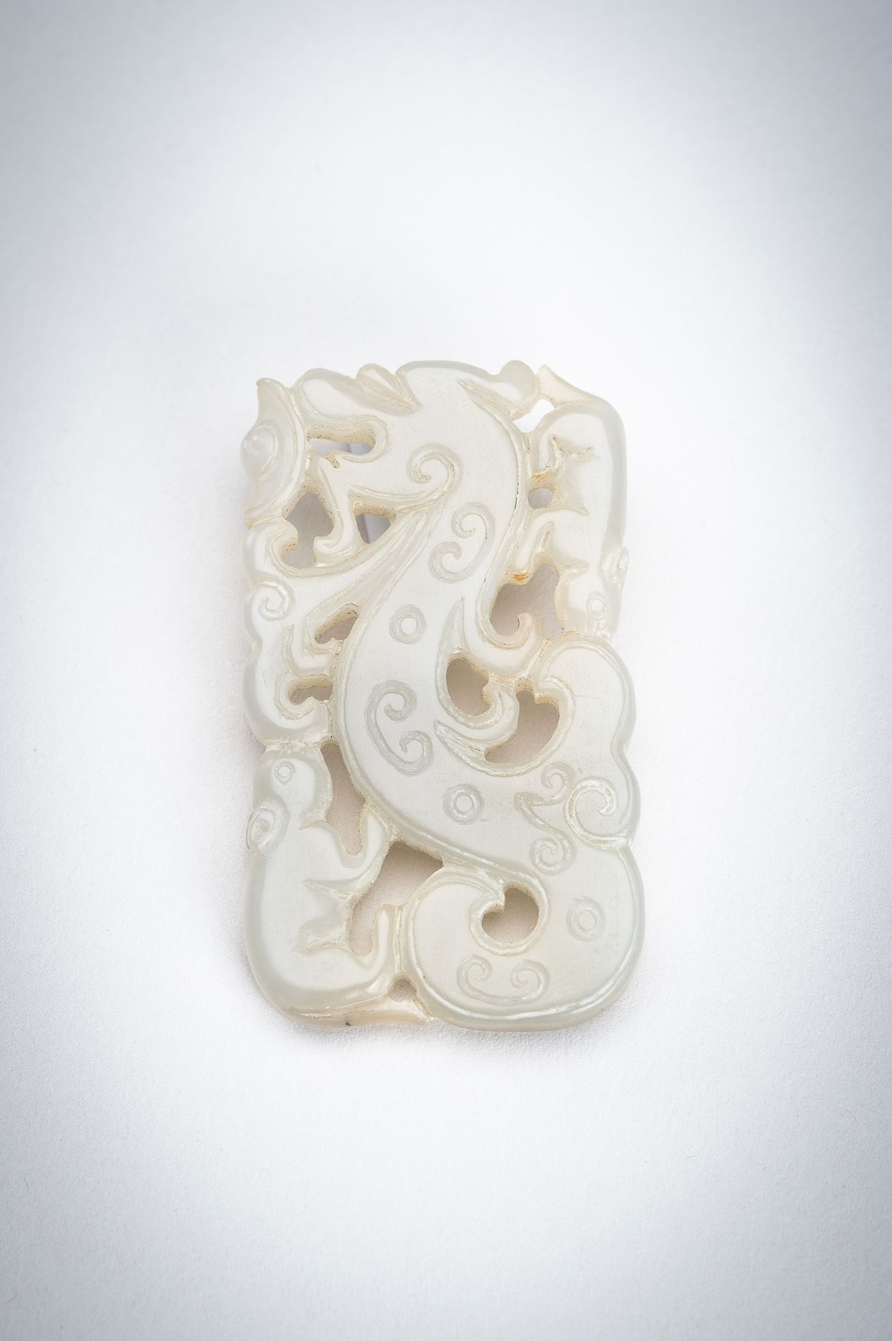 A CELADON-WHITE JADE 'DRAGON AND TAPIR' PENDANT, QING DYNASTY - Image 3 of 7