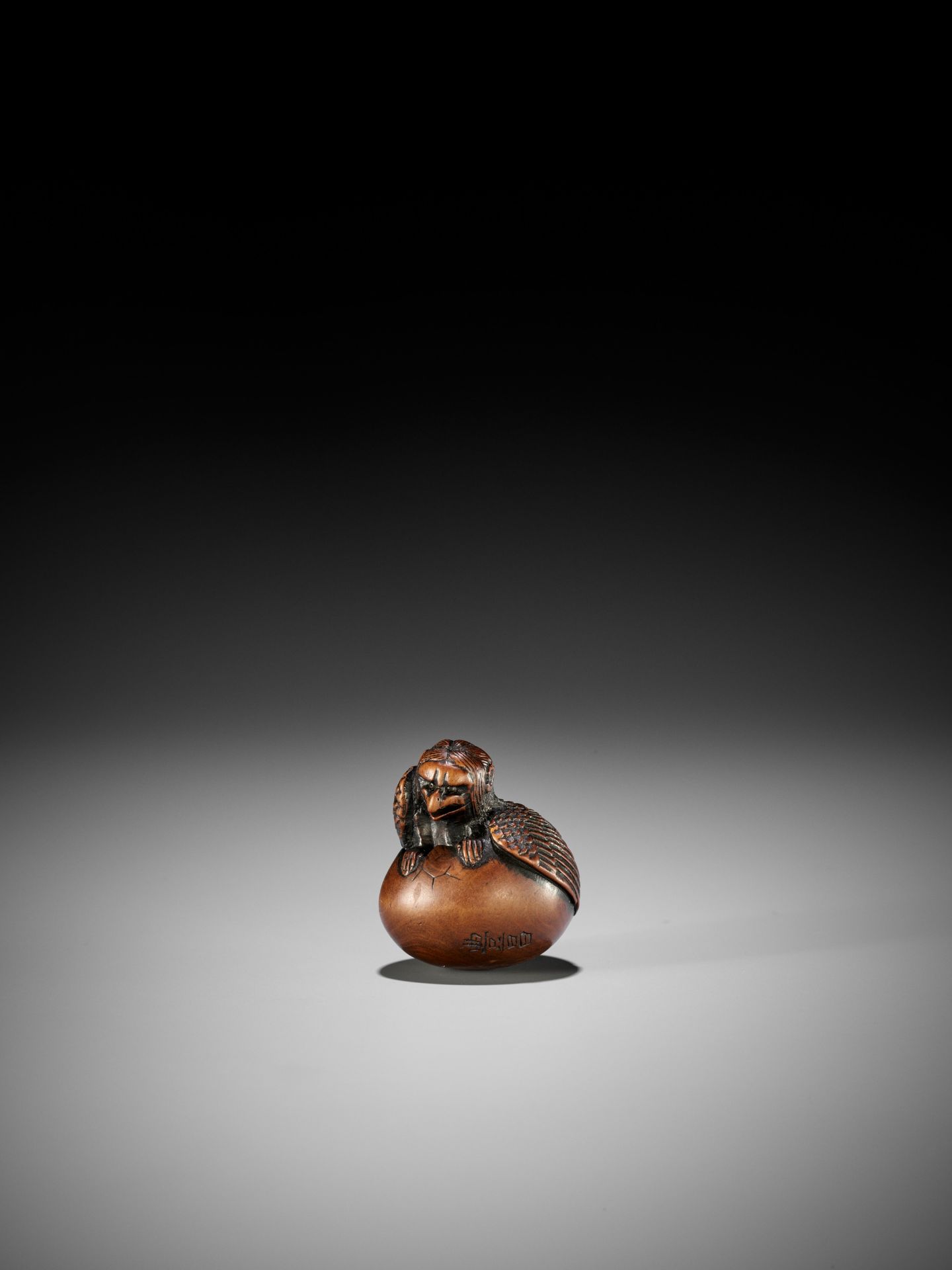 NAITO TOYOMASA: A FINE WOOD NETSUKE OF A HATCHING TENGU (TENGU NO TOMAGO) - Image 8 of 17