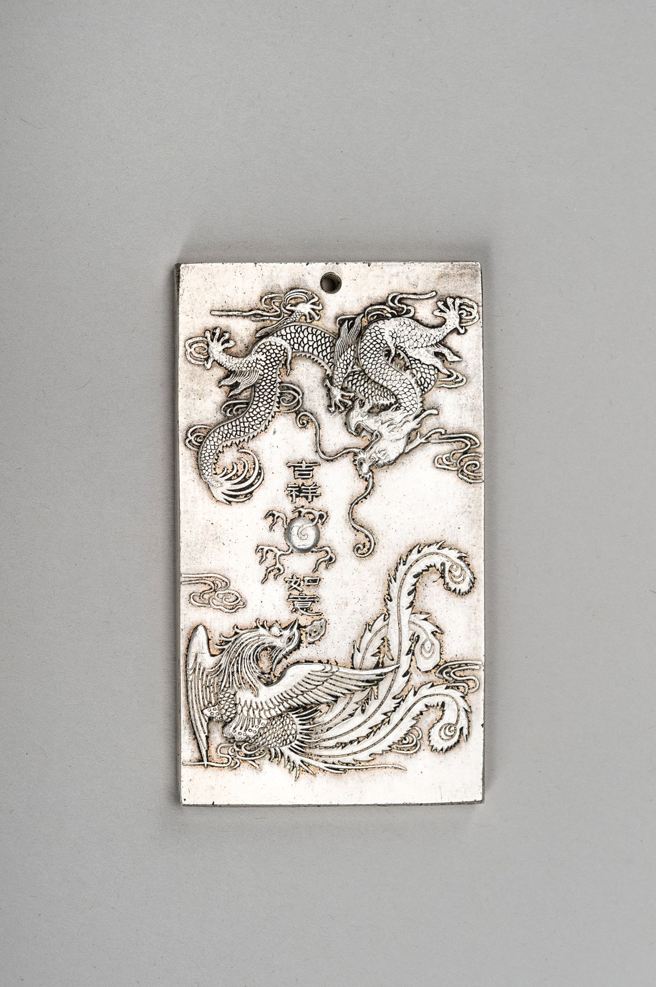 A GROUP OF EIGHT CHINESE 'TIBETAN SILVER' BULLION AMULETS - Bild 13 aus 19