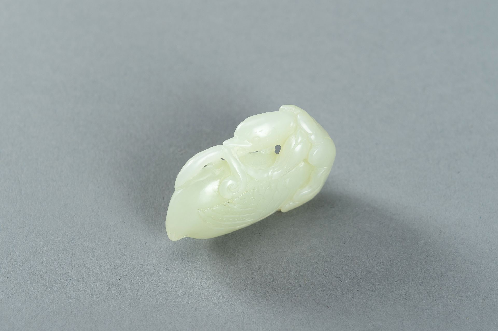 A PALE CELADON JADE CARVING OF A DUCK, 1900s - Image 4 of 13