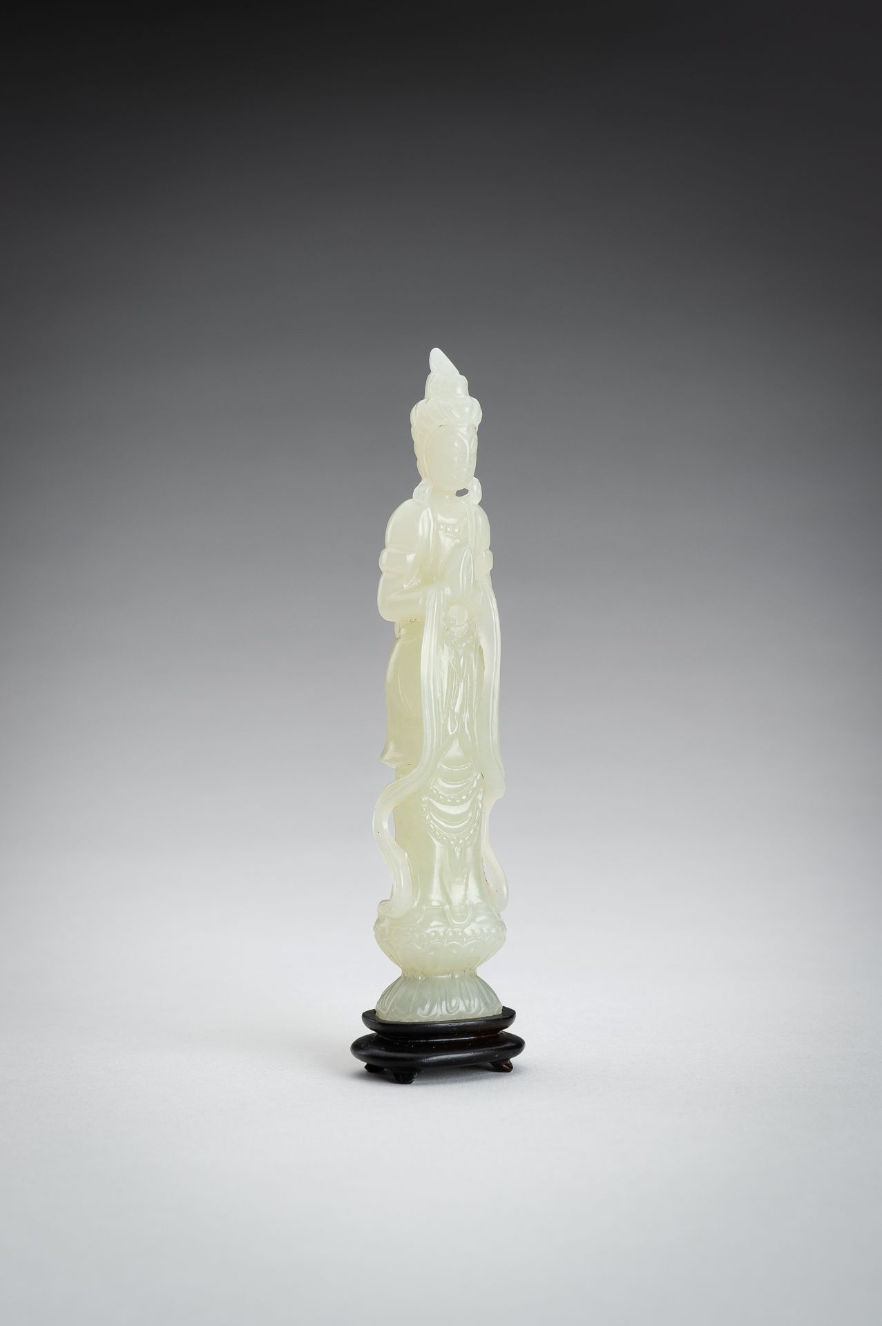 A PALE CELADON JADE CARVING OF A GUANYIN, 1900s - Image 8 of 11