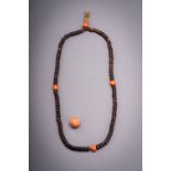 A LOT WITH A 108-BEAD MALA AND A CORAL BEAD