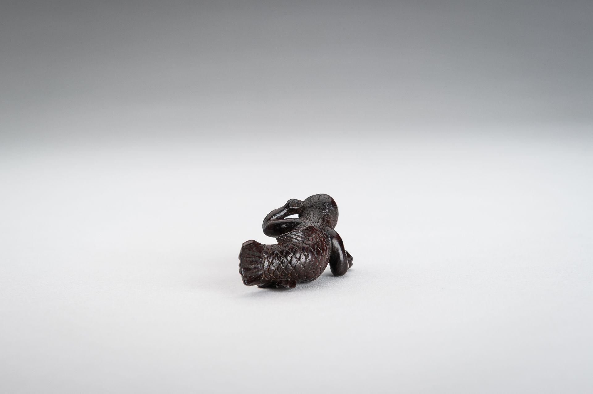 A WOOD NETSUKE OF A SWIMMING NINGYO (MERMAID) - Image 7 of 10