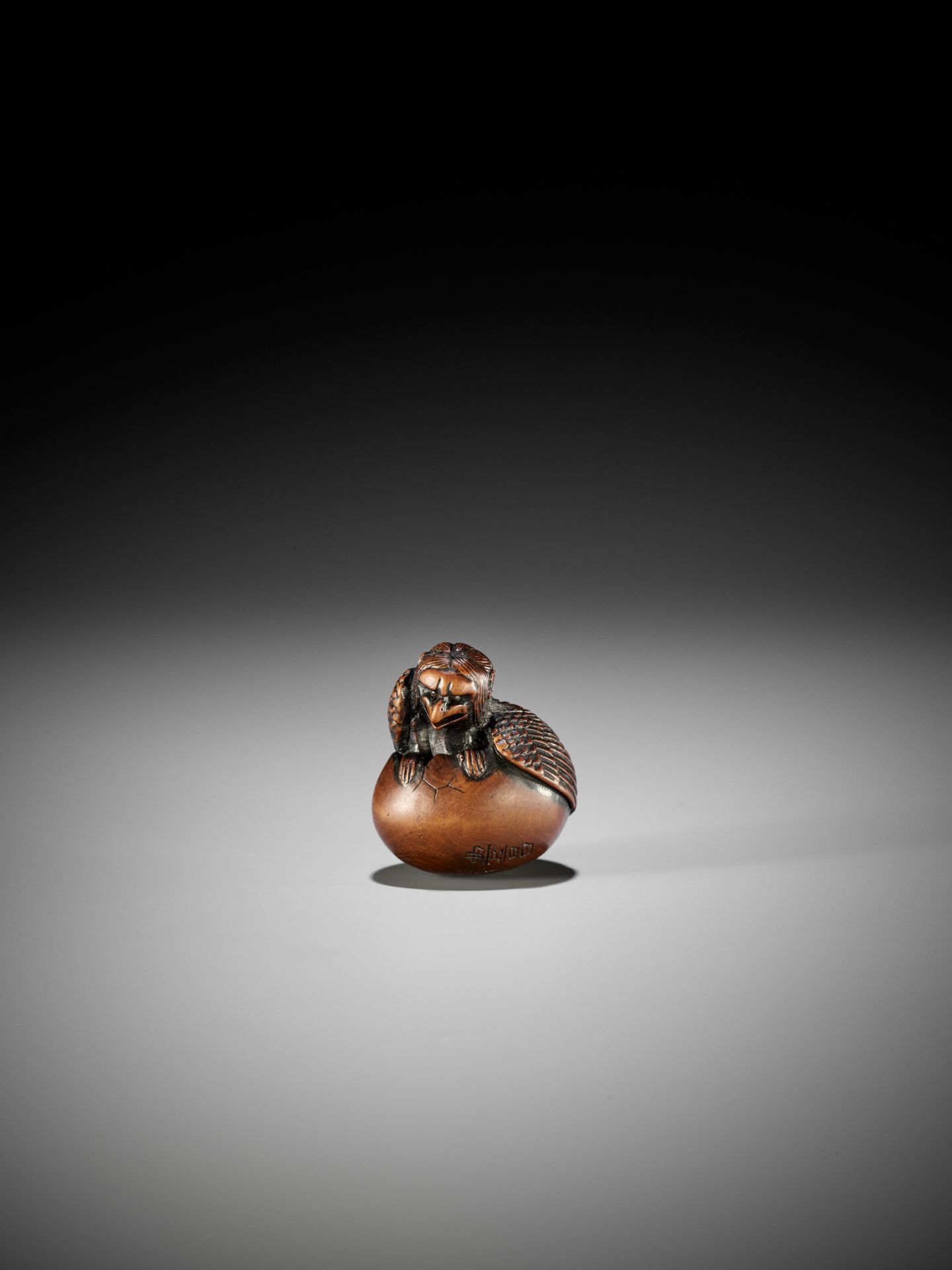 NAITO TOYOMASA: A FINE WOOD NETSUKE OF A HATCHING TENGU (TENGU NO TOMAGO) - Image 13 of 17