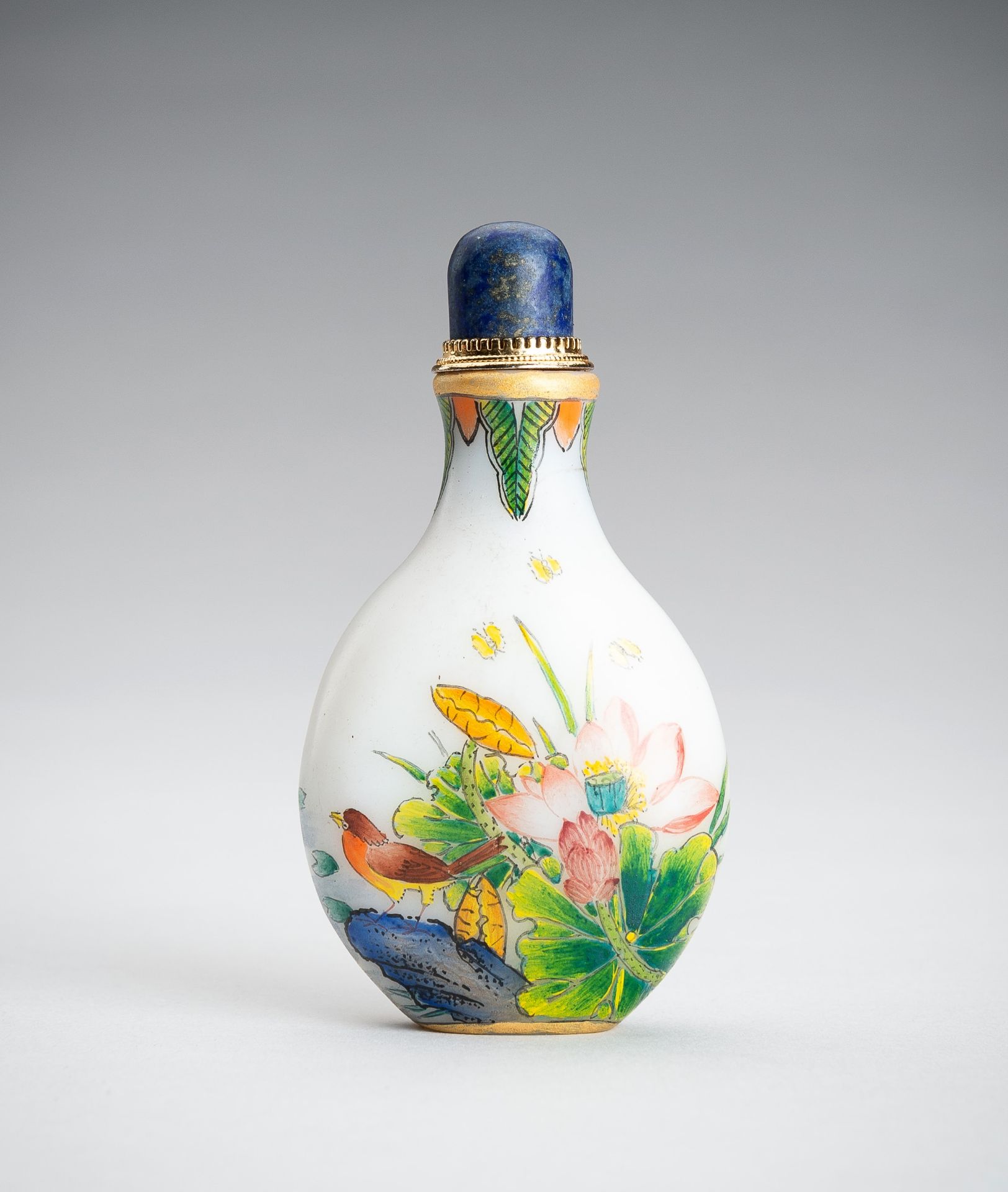 AN ENAMELED GLASS SNUFF BOTTLE WITH FLOWERS AND BIRDS, REPUBLIC