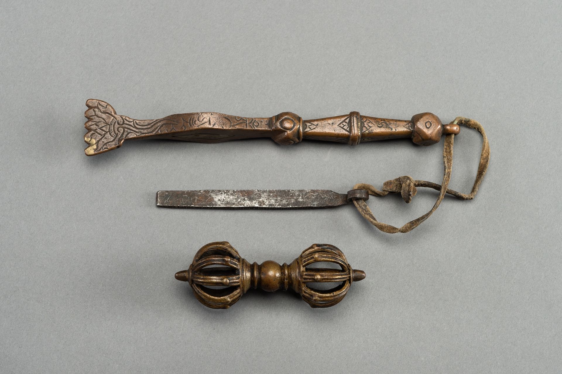 A BRONZE VAJRA AND TWO RITUAL INSTRUMENTS