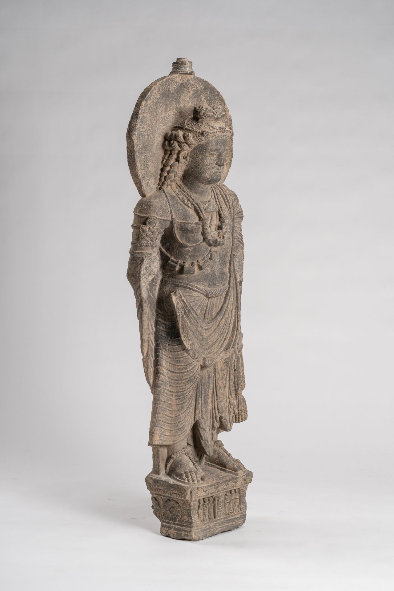 A GANDHARA-STYLE GRAY SCHIST FIGURE OF MAITREYA - Image 3 of 8