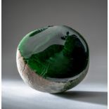 A TRANSLUCENT GREEN GLASS 'COSMIC EGG', HAN DYNASTY