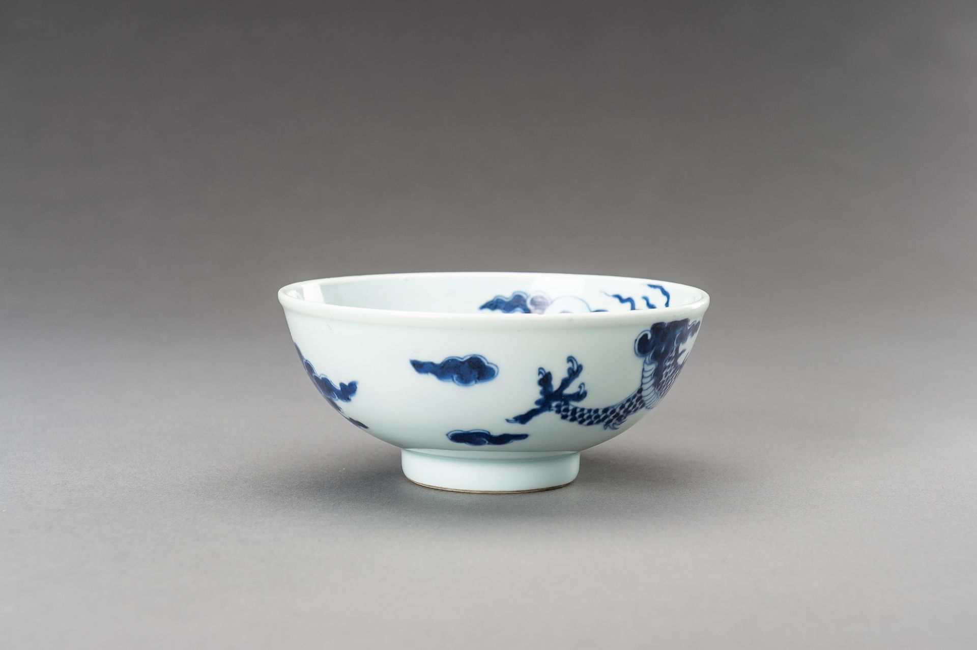 A BLUE AND WHITE 'DRAGON' PORCELAIN BOWL, 1920s - Image 3 of 14