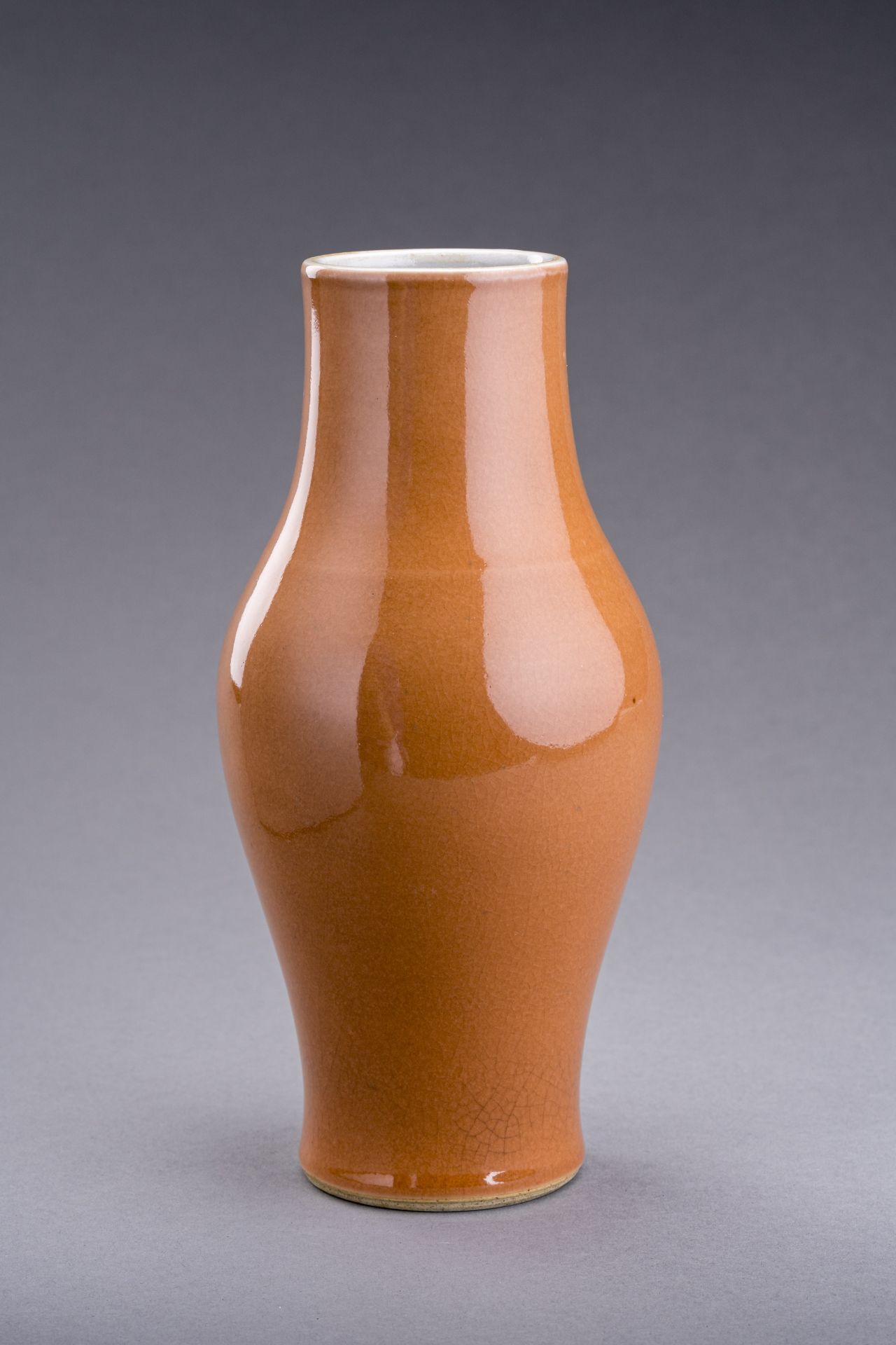 A PALE CORAL GLAZED OLIVE-FORM VASE, QING DYNASTY - Image 4 of 6