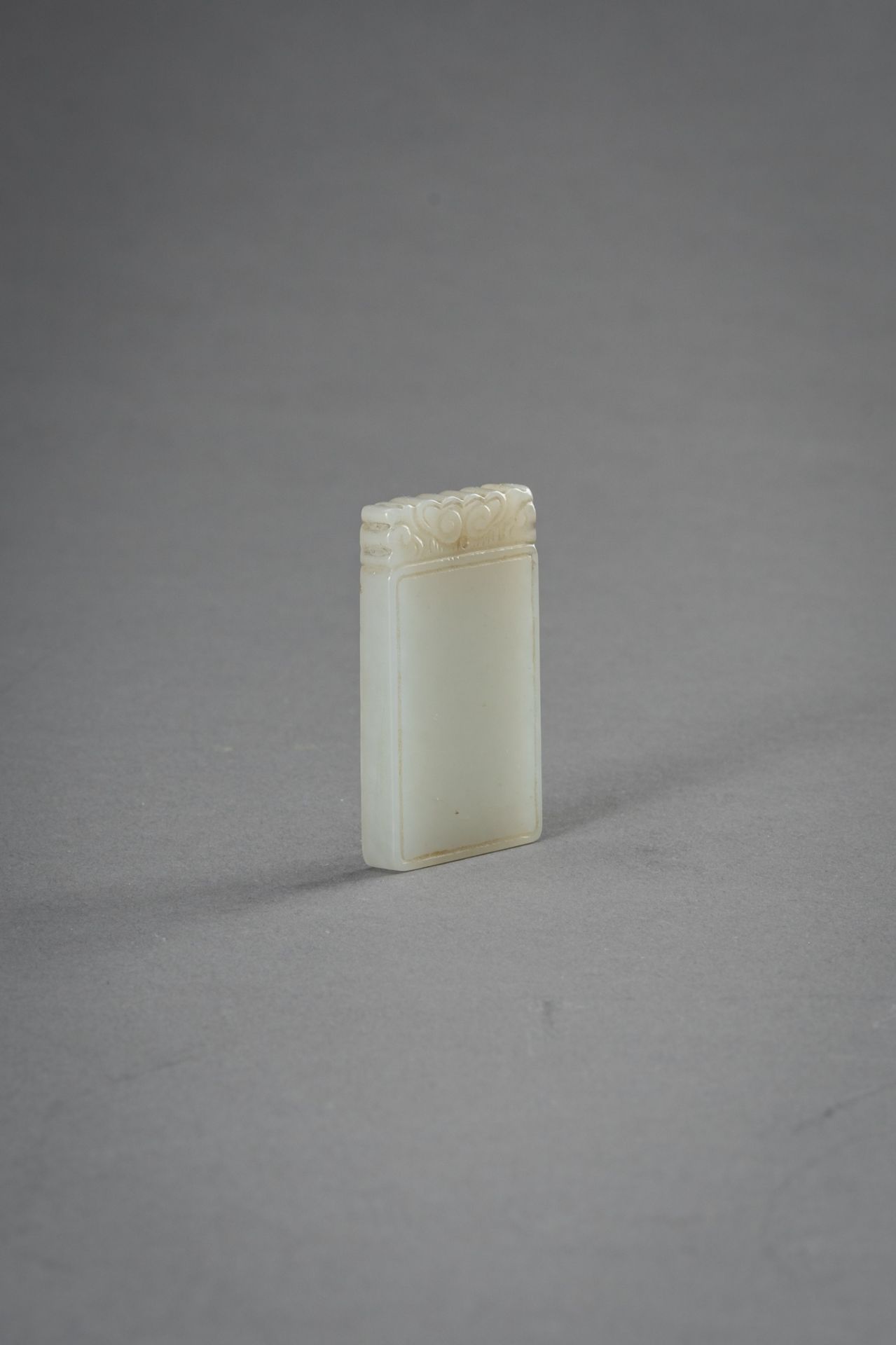 A MINIATURE WHITE JADE PLAQUE, 1930s - Image 8 of 8
