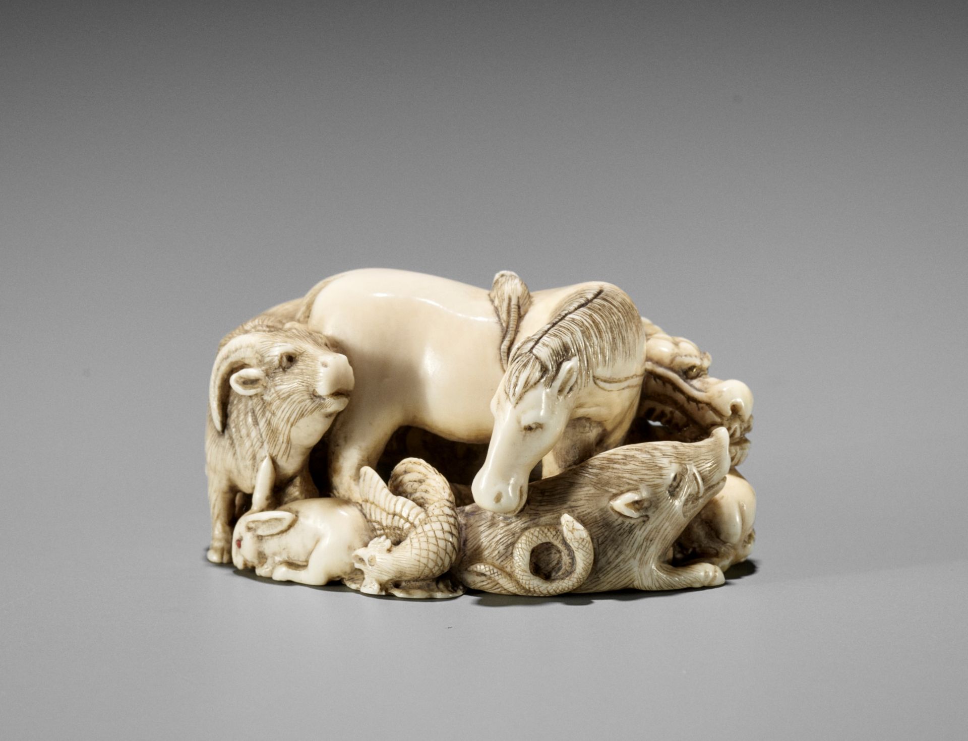 MEIGYOKUSAI: AN IVORY NETSUKE OF THE JUNISHI