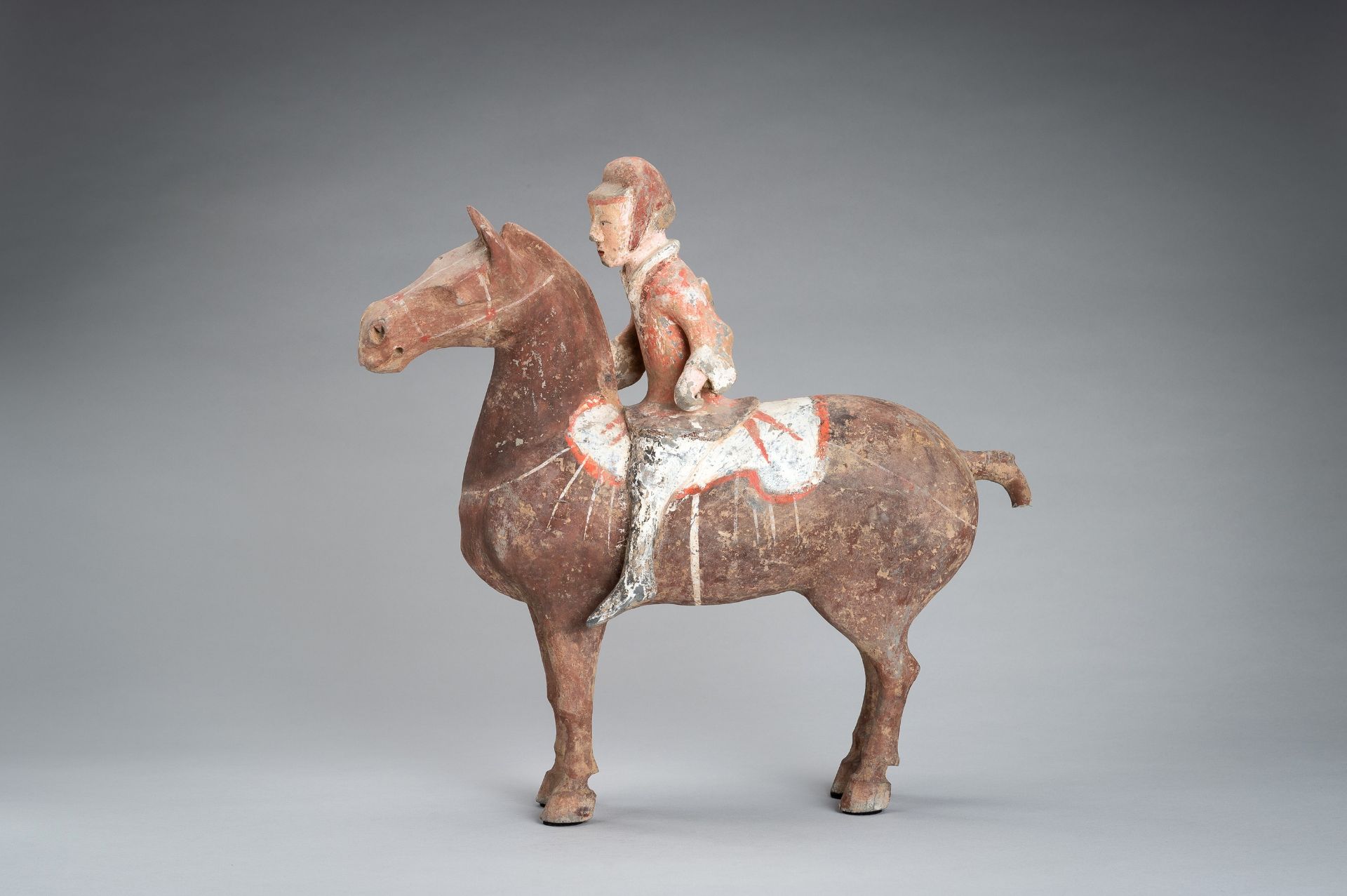 A POTTERY FIGURE OF AN EQUESTRIAN, HAN DYNASTY - Image 2 of 13