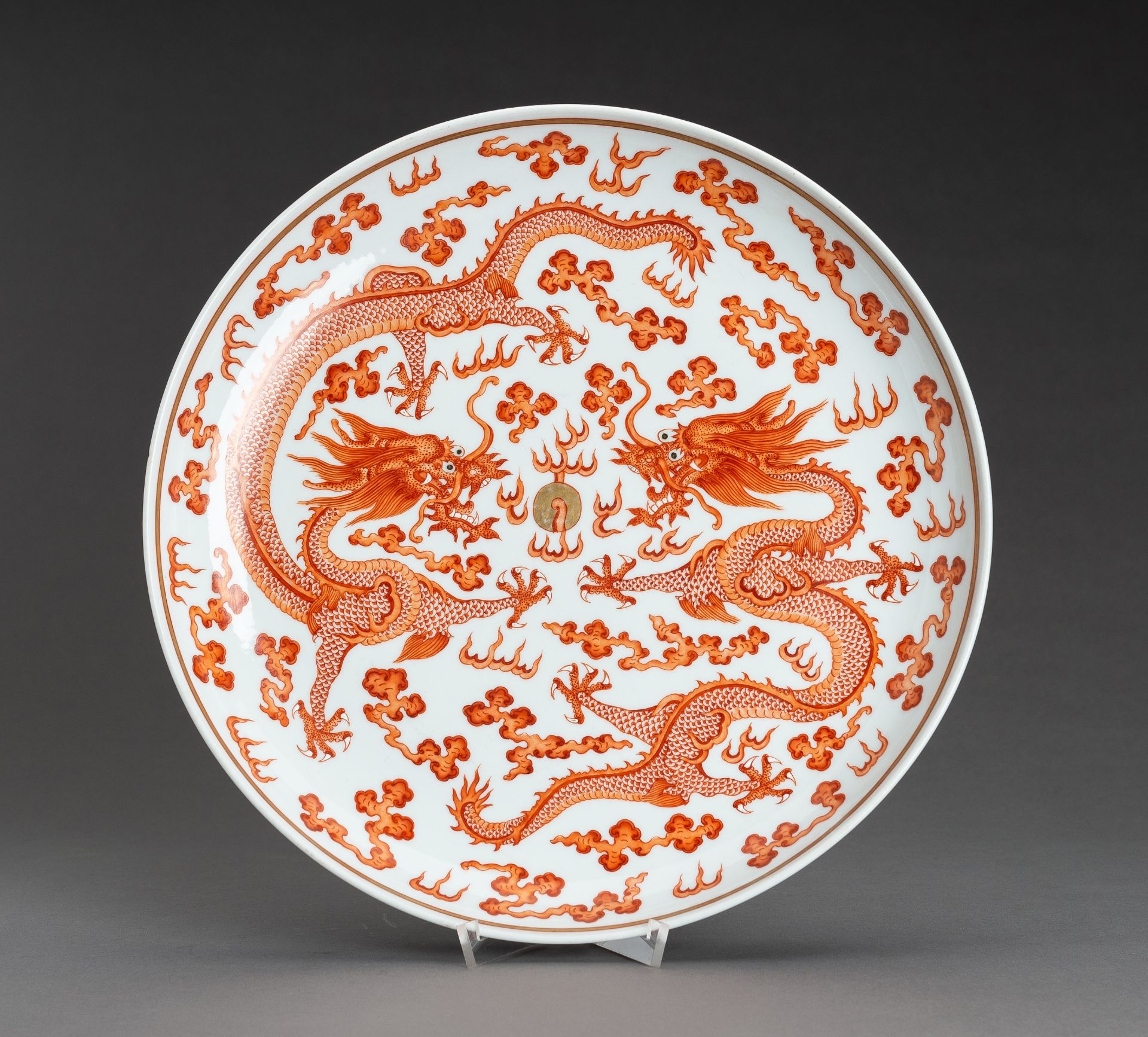 A LARGE IRON-RED 'DRAGONS' PORCELAIN DISH