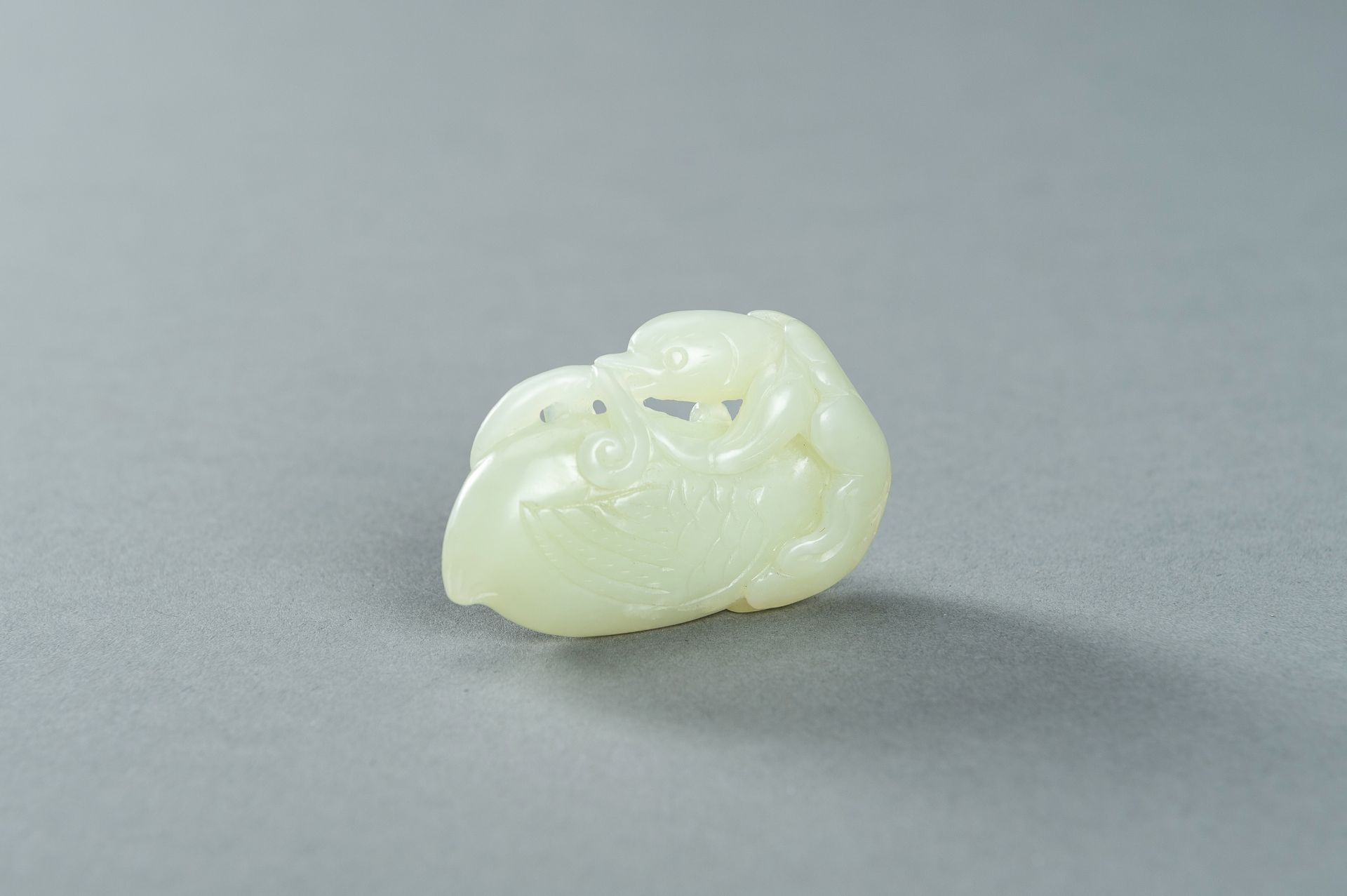 A PALE CELADON JADE CARVING OF A DUCK, 1900s - Image 5 of 13