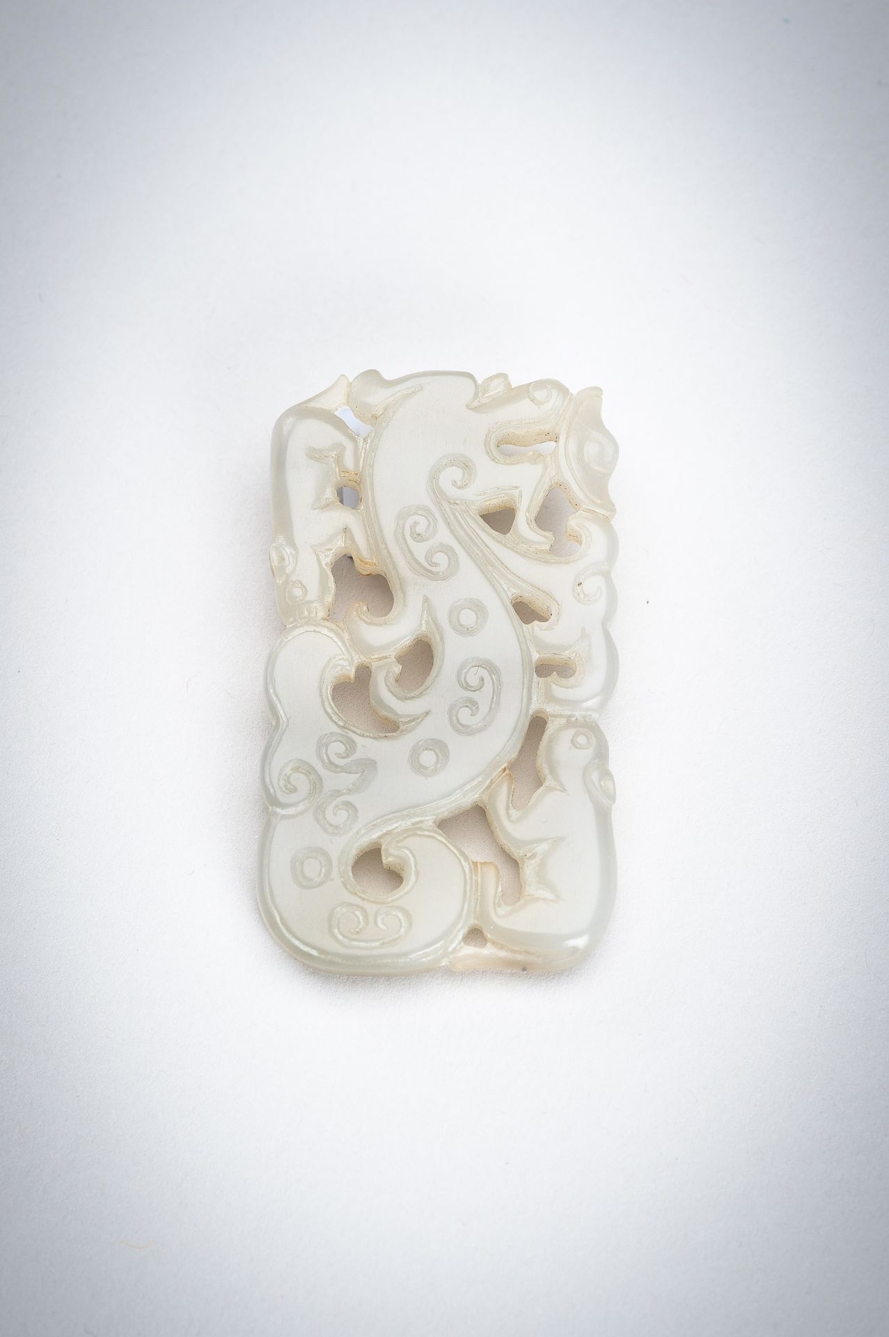 A CELADON-WHITE JADE 'DRAGON AND TAPIR' PENDANT, QING DYNASTY - Image 5 of 7