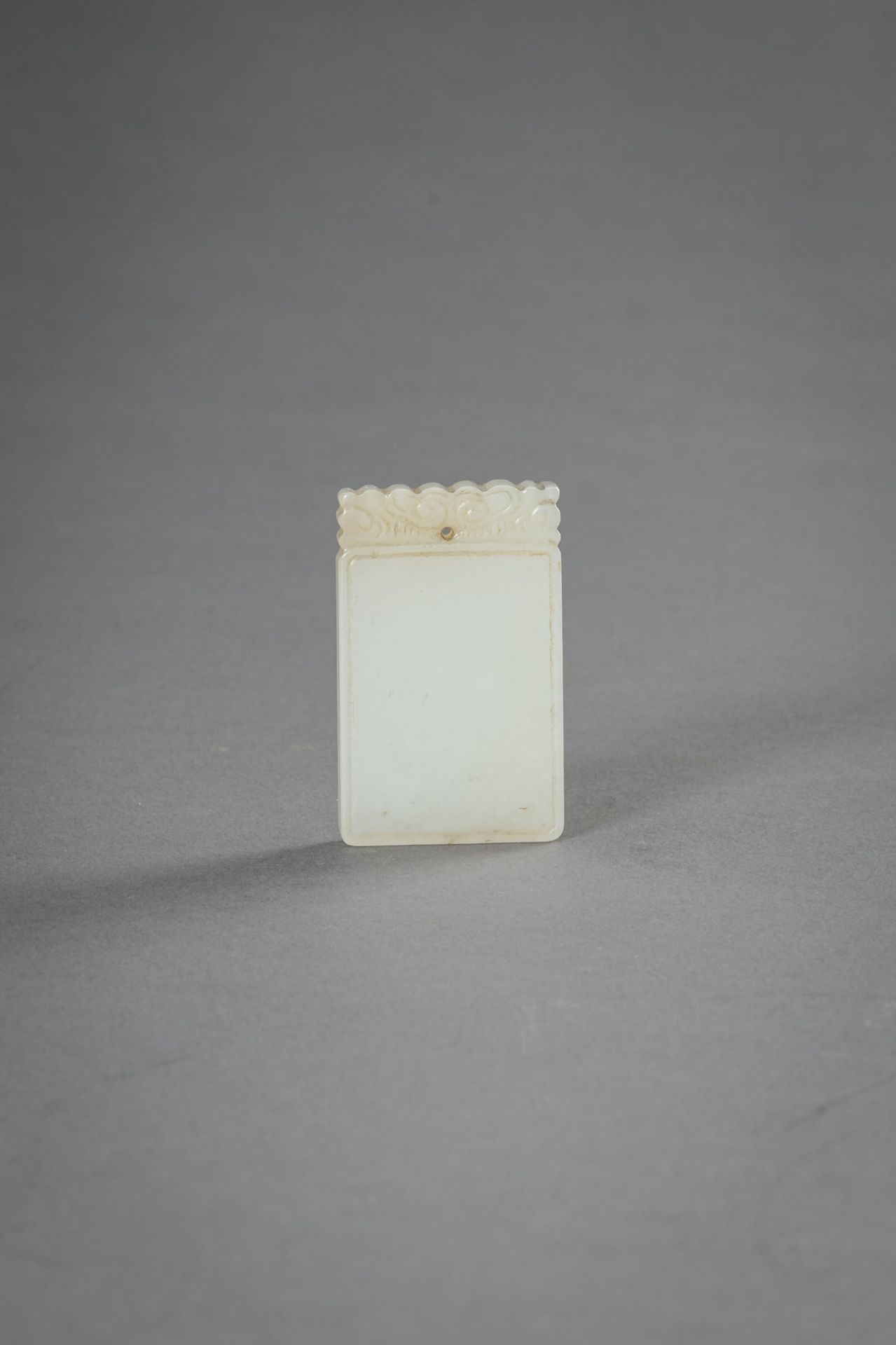 A MINIATURE WHITE JADE PLAQUE, 1930s - Image 4 of 8