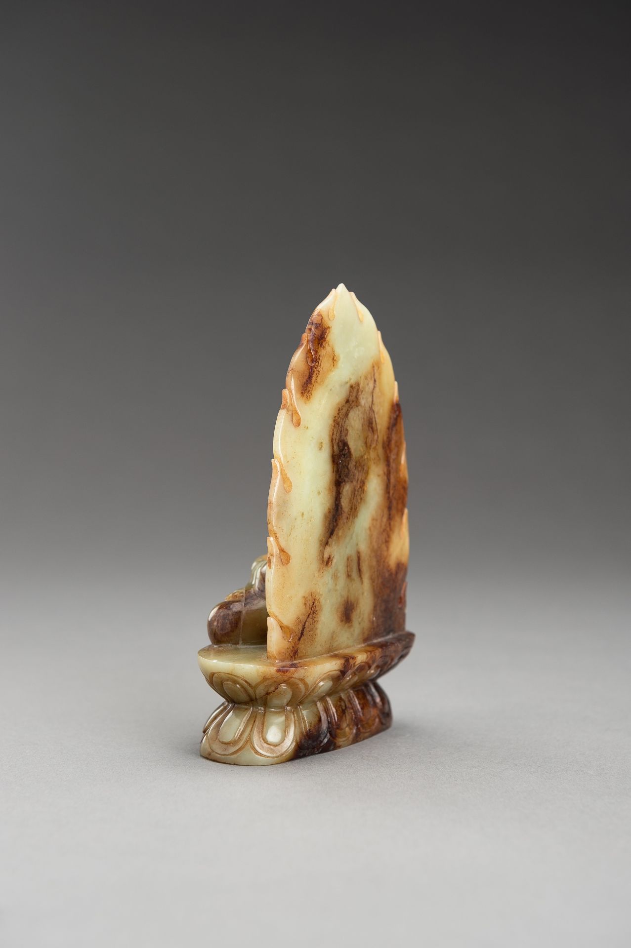 A PALE CELADON AND RUSSET JADE FIGURE OF BUDDHA - Image 5 of 10