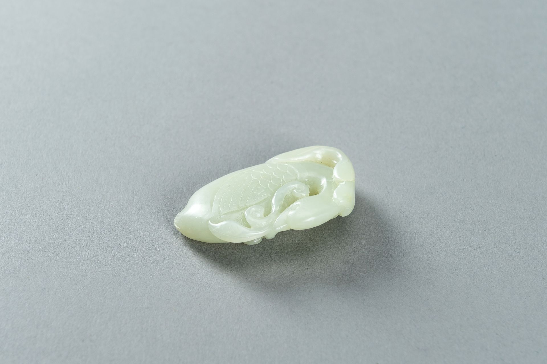 A PALE CELADON JADE CARVING OF A DUCK, 1900s - Image 6 of 13