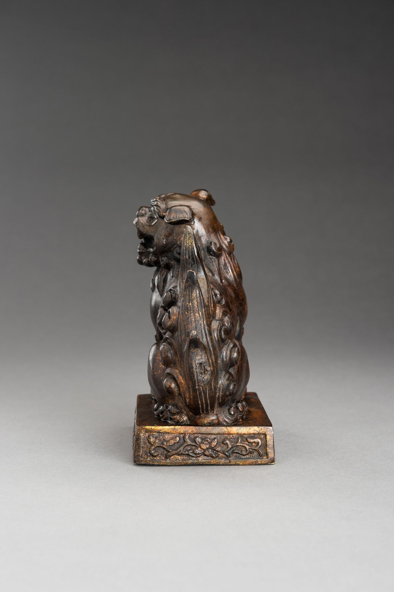 A LACQUER GILT BRONZE FIGURE OF A BUDDHIST LION, QING - Image 11 of 13