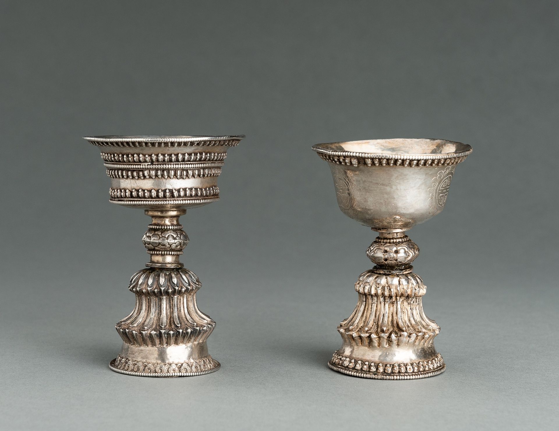 TWO TIBETAN SILVER BUTTER LAMPS, 19th CENTURY