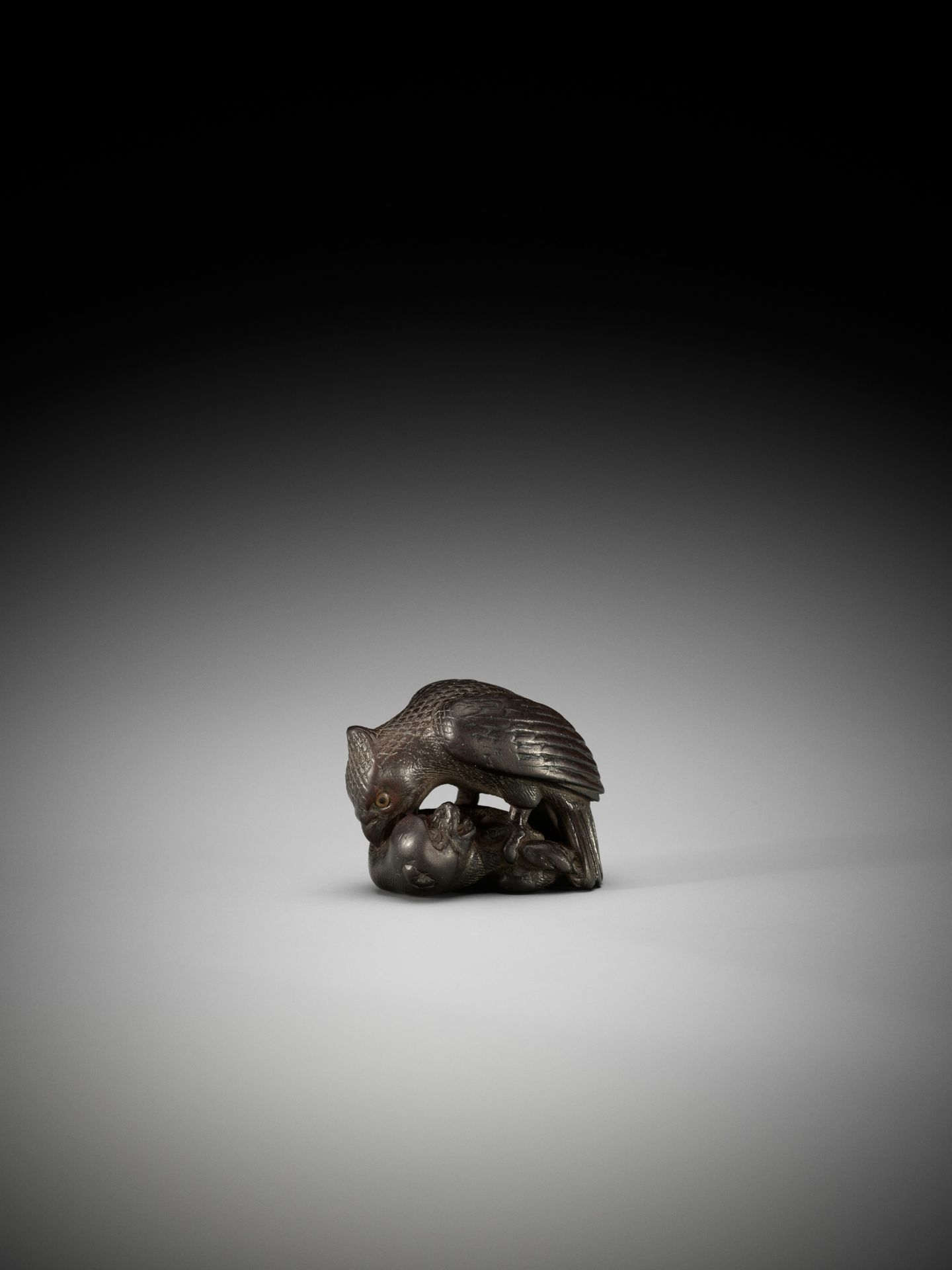 SHINCHUKA: A VERY RARE AND LARGE DARK WOOD NETSUKE OF AN EAGLE SNATCHING A MONKEY - Image 2 of 8