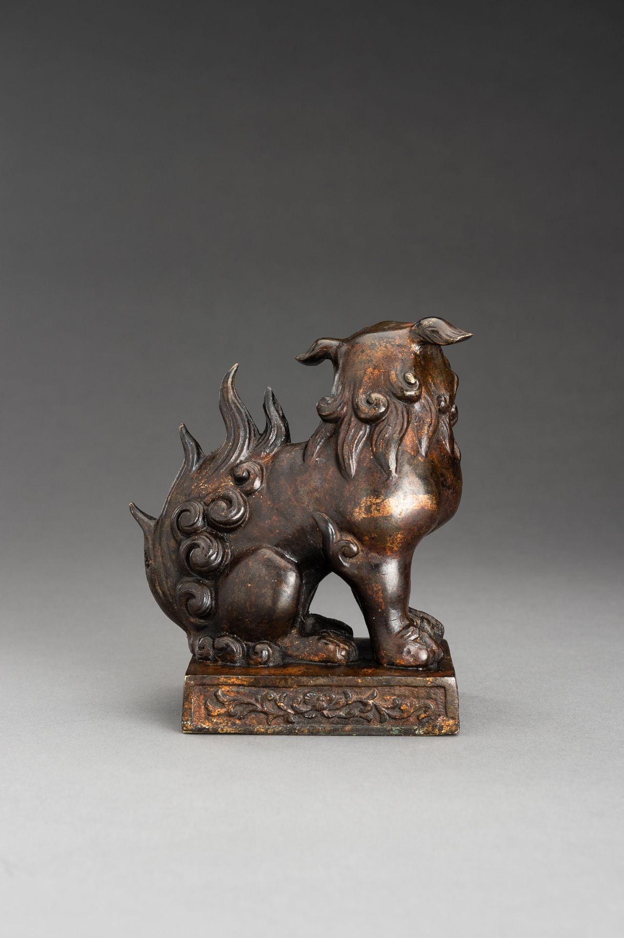 A LACQUER GILT BRONZE FIGURE OF A BUDDHIST LION, QING - Image 9 of 13