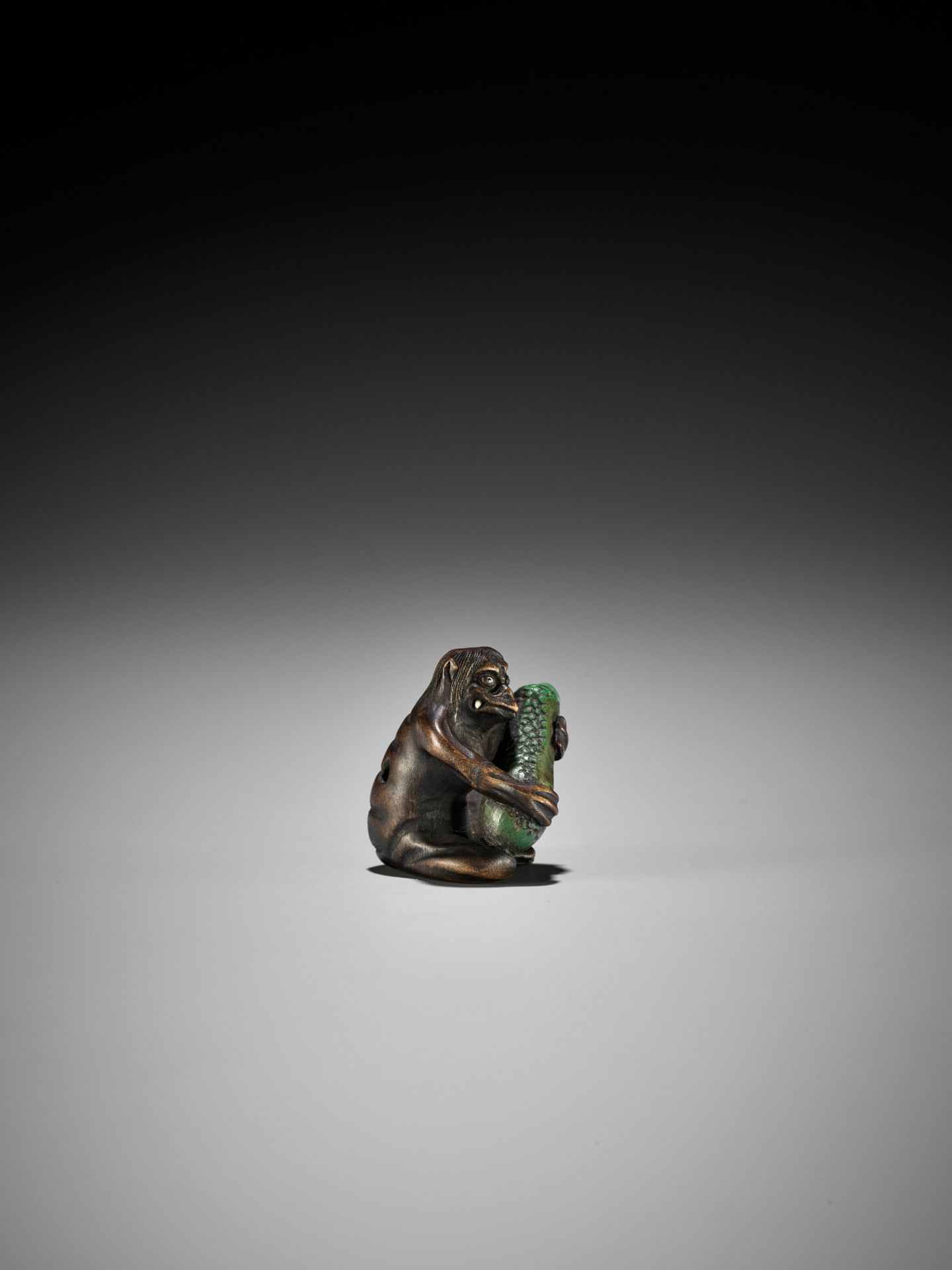 JUGYOKU: A RARE WOOD AND STAG ANTLER NETSUKE OF A KAPPA PLAYING THE CUCUMBER - Image 11 of 14