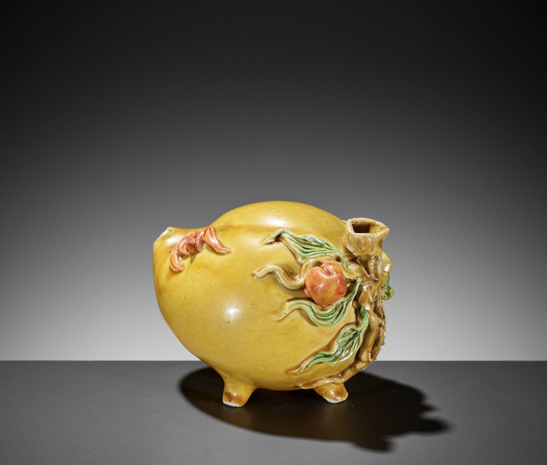AN IMPERIAL YELLOW GLAZED PEACH-FORM WATER DROPPER, QING DYNASTY