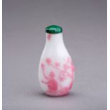 A PINK OVERLAY GLASS SNUFF BOTTLE, QING DYNASTY