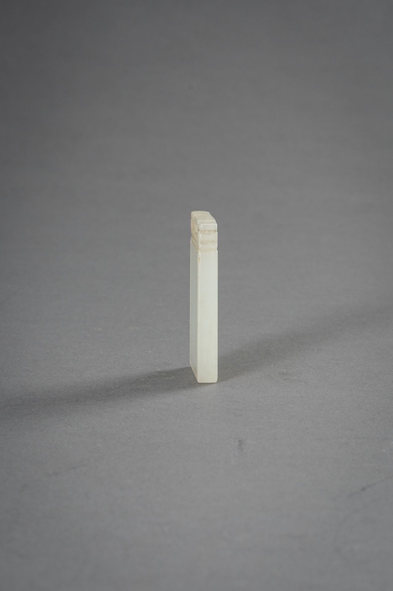 A MINIATURE WHITE JADE PLAQUE, 1930s - Image 6 of 8