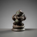 A SMALL BRONZE FIGURE OF GANESHA, 12TH CENTURY OR EARLIER