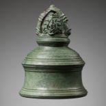 A 'GANESHA' BRONZE BELL, KHMER EMPIRE, ANGKOR PERIOD, 11TH-12TH CENTURY