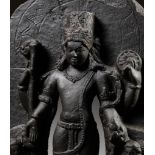 A GRAY SCHIST STELE OF VISHNU, NORTHEASTERN INDIA, PALA PERIOD, 11TH - 12TH CENTURY