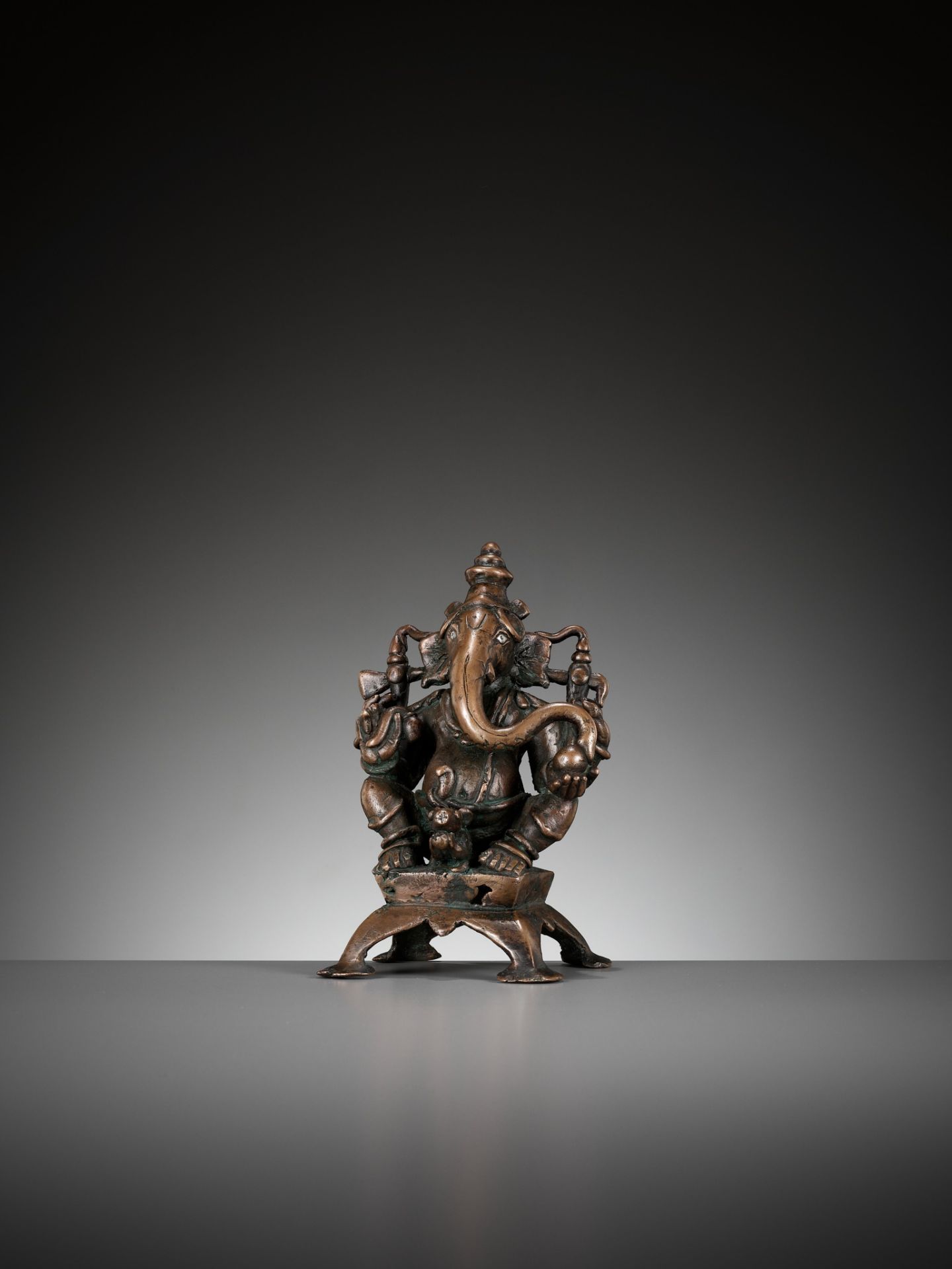 A SILVER-INLAID COPPER ALLOY FIGURE OF GANESHA, SOUTH INDIA, C. 1650-1750 - Image 2 of 12