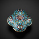 AN EXTREMELY RARE CLOISONNE ENAMEL QUADRILOBED BOX AND COVER, QIANLONG MARK AND OF THE PERIOD